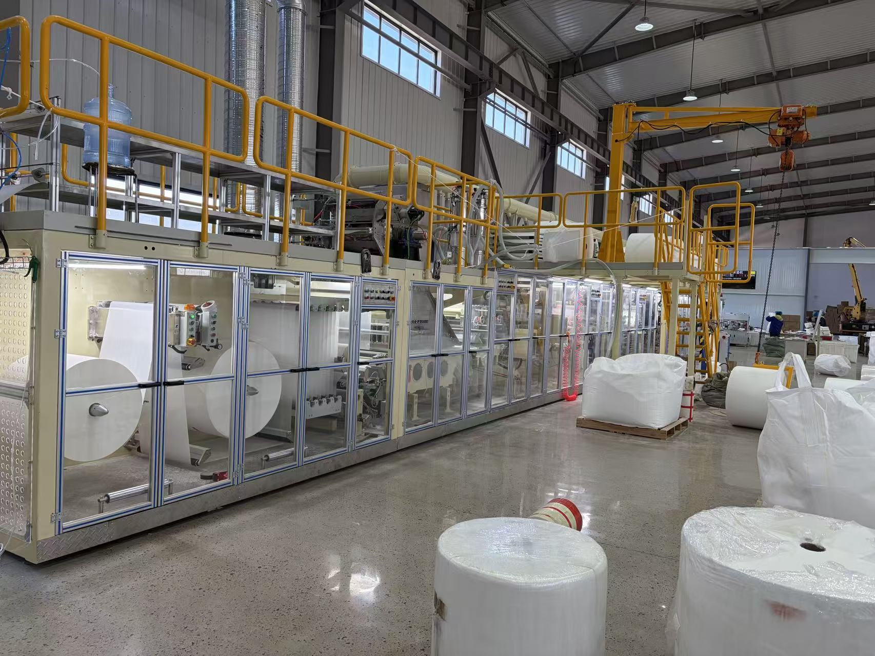 Automated pet training pad manufacturing assembly line - Jinzhao Factory China
